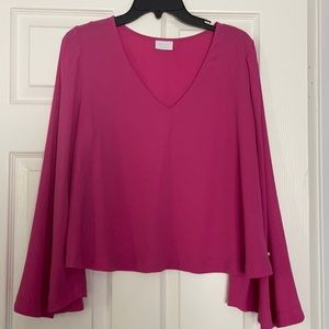 Pink blouse with pearl sleeve accent